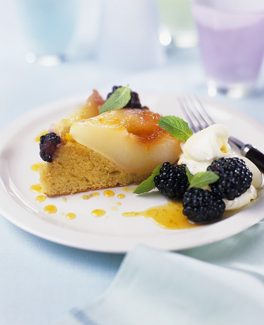 A piece of pear and blackberry cake