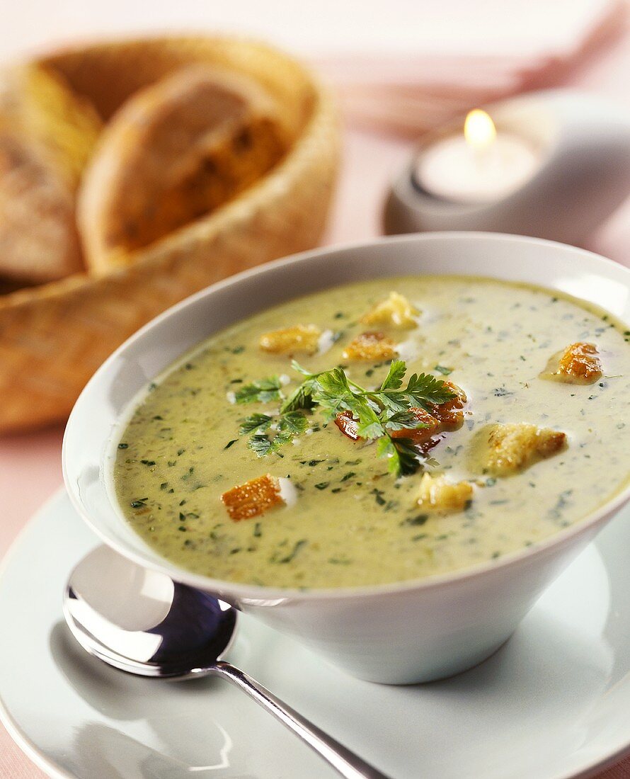 Lettuce soup with garlic croutons