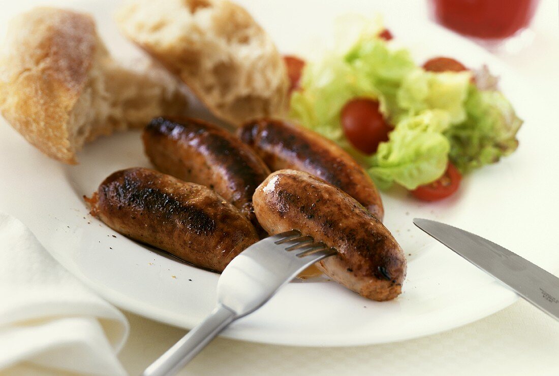 British sausages with lettuce and bread