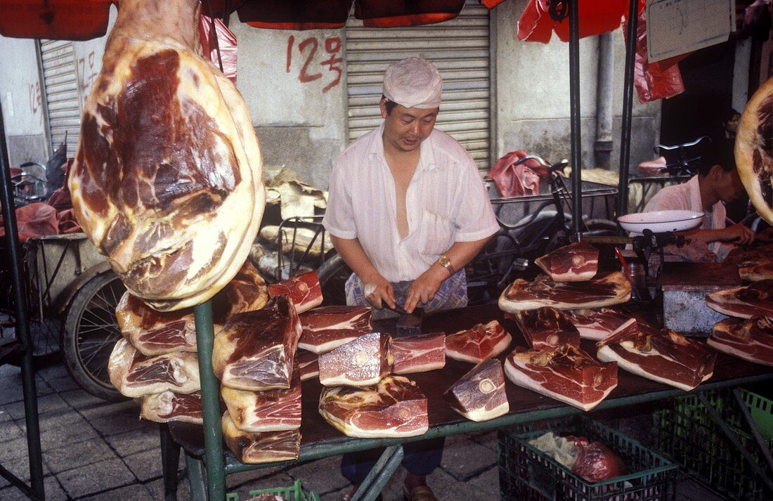 Market stall with air-dried ham (South West China)
