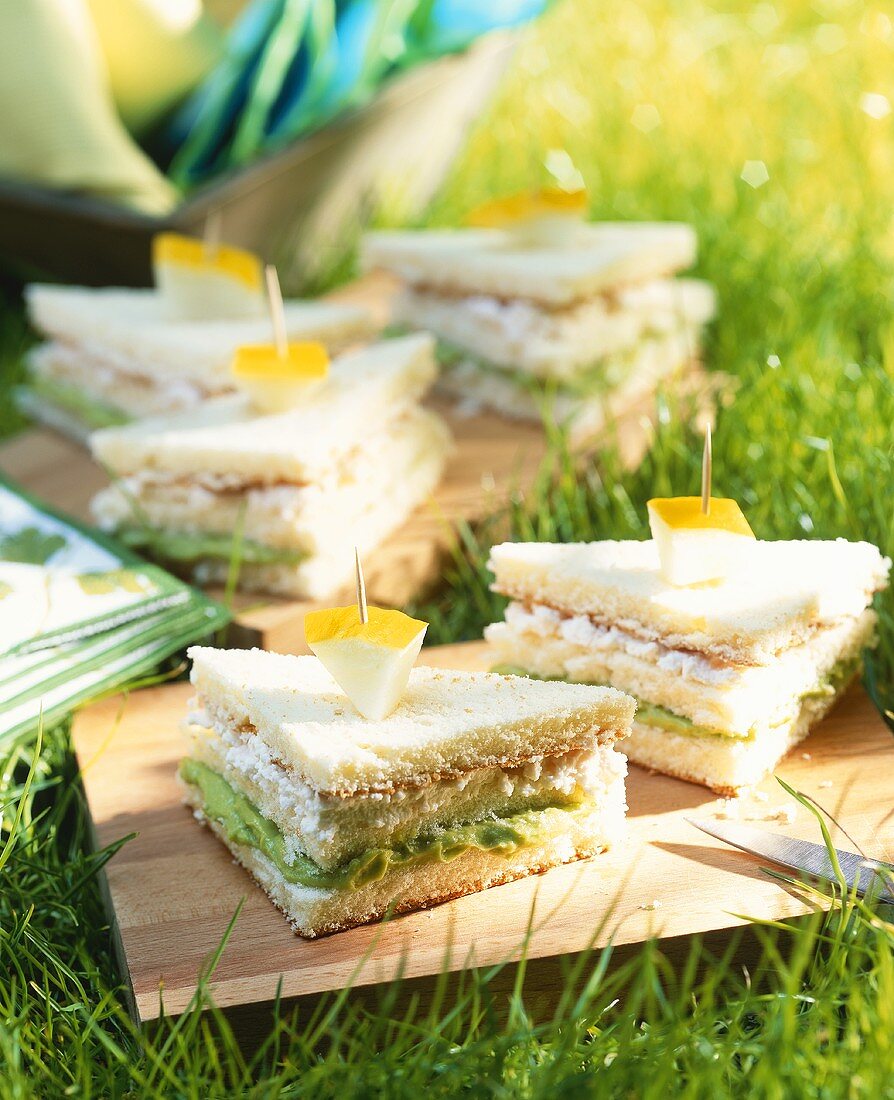 Club sandwich with cream cheese and avocado mousse