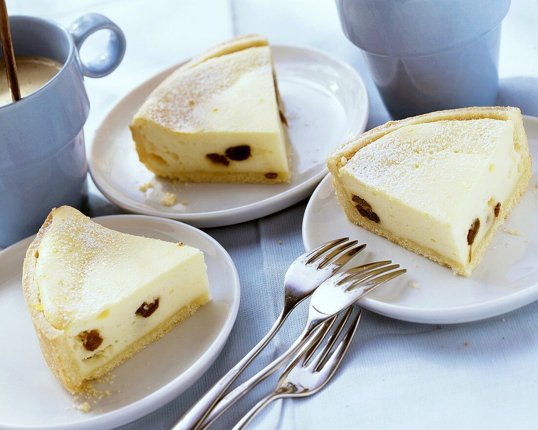 Cheesecake with raisins on three plates