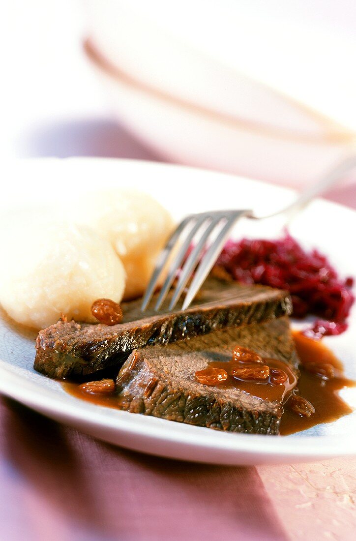 Braised pickled beef with raisins