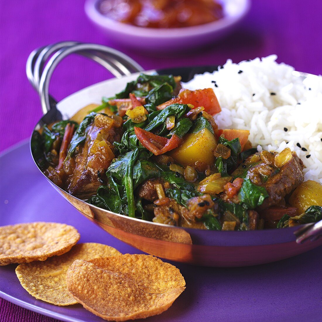 Lamb curry with spinach and rice