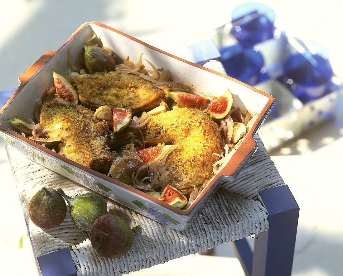 Oven-baked rabbit with onions and figs