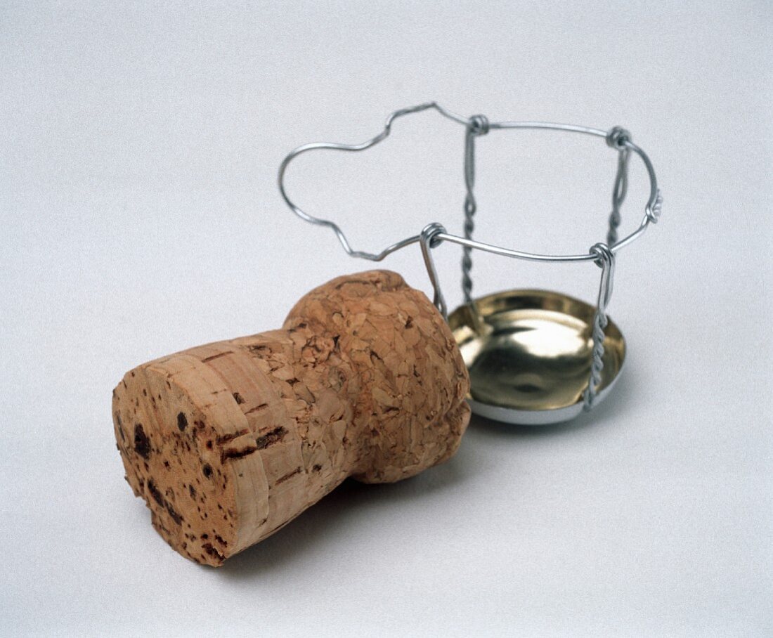A champagne cork, wire fastening beside it
