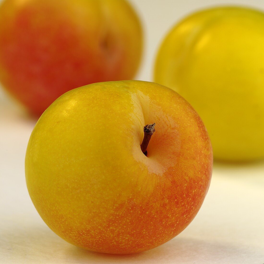 Yellowish-red plums