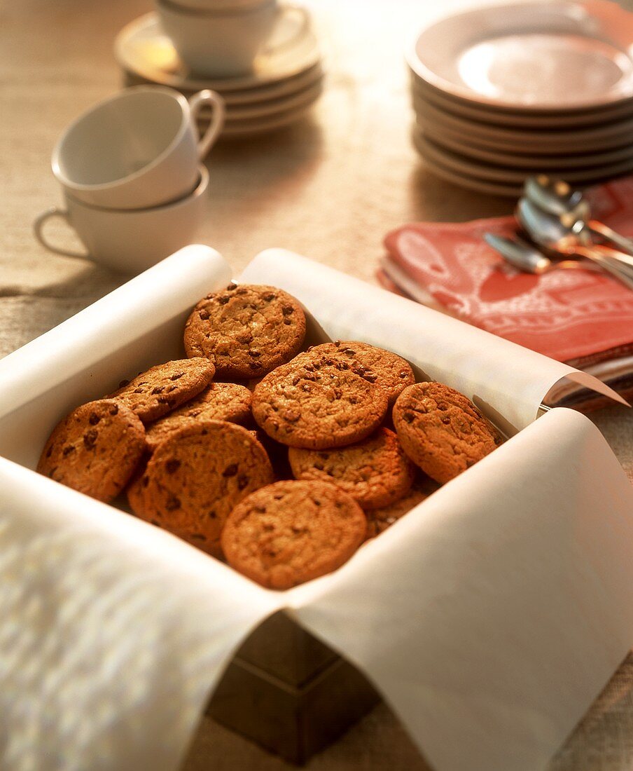 Chocolate chip cookies in a biscuit tin