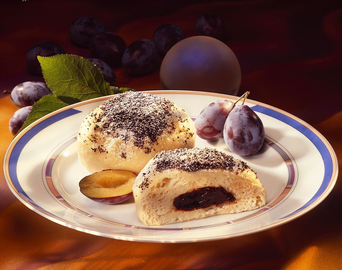 Yeast dumpling with plum puree and poppy seeds