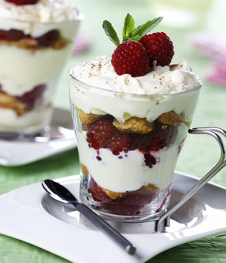 Layered dessert with raspberries, biscotti & cream