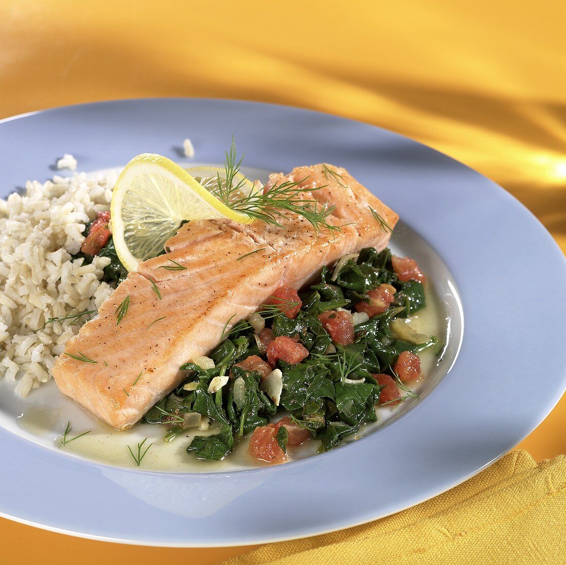 Salmon fillet with spinach and rice