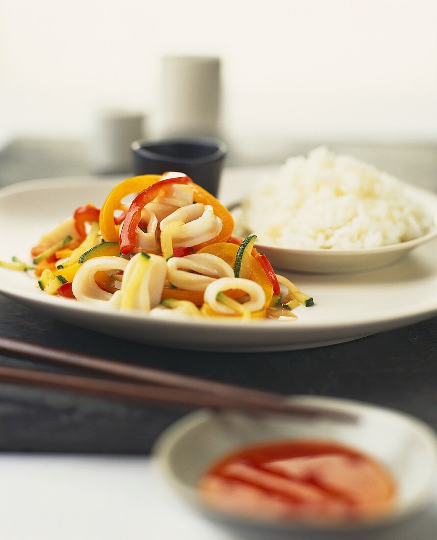 Squid rings with peppers, sweet and sour