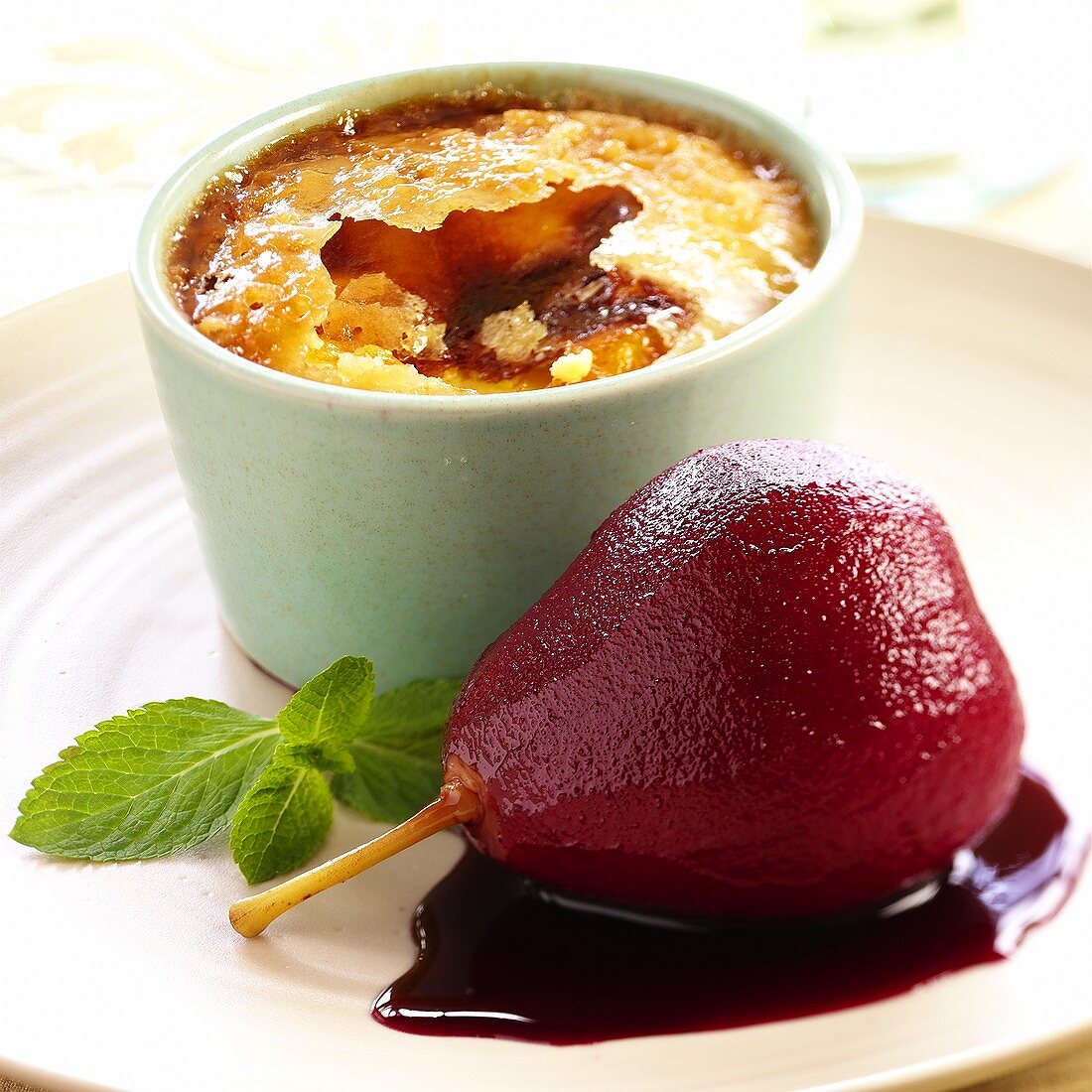 Poached red wine pear with crème brulee