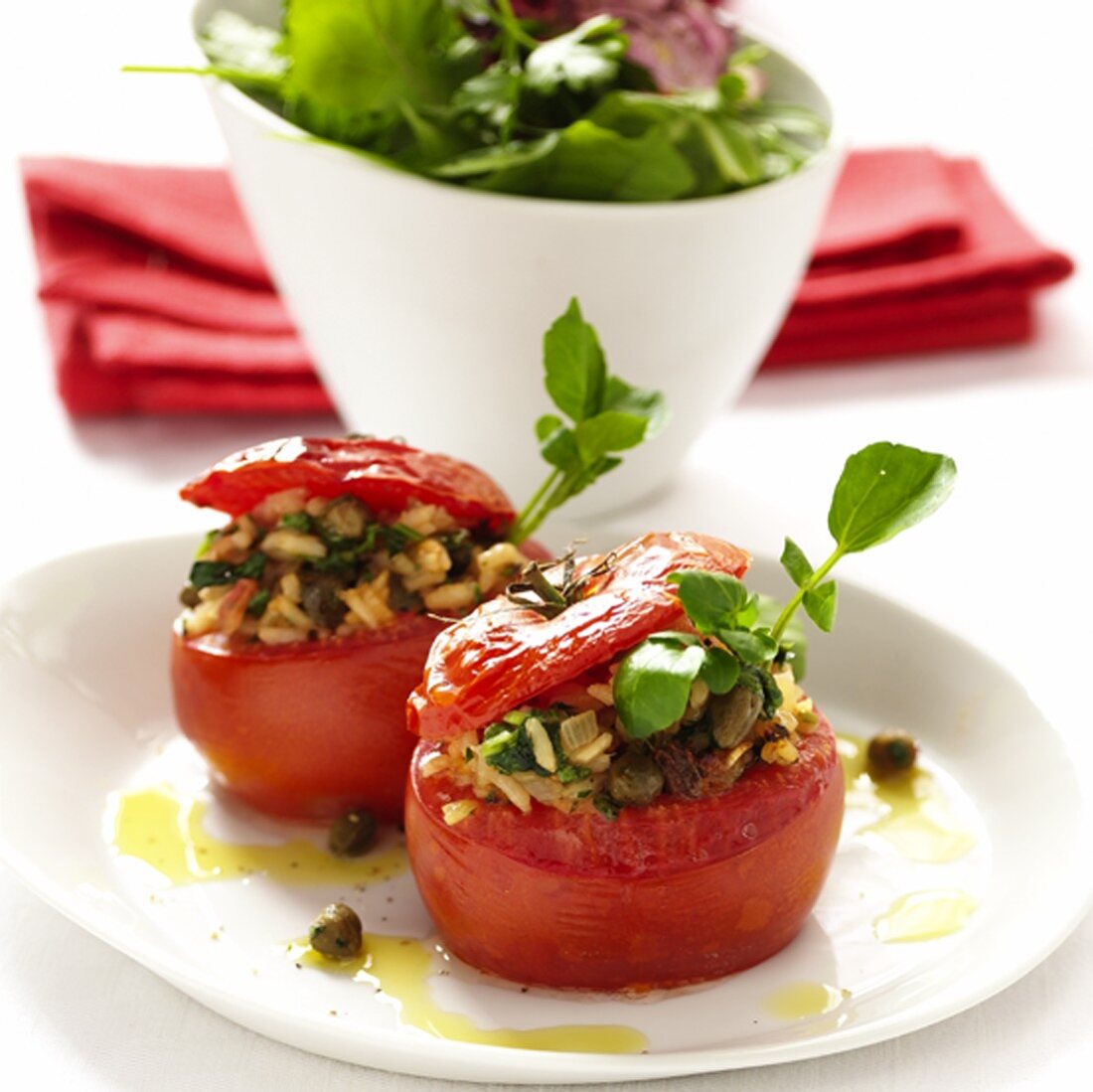 Stuffed tomatoes with rice, capers and dried tomatoes