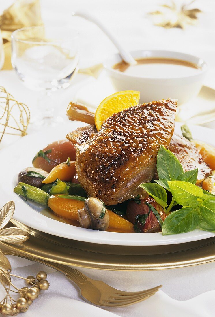Roast goose with orange sauce and vegetables
