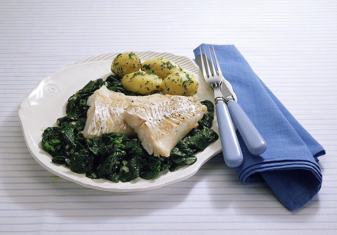 Cod fillet on bed of spinach