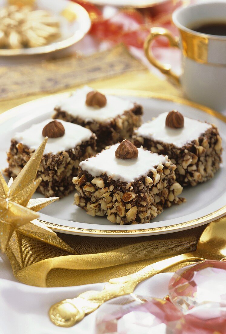 Small hazelnut cake on Christmassy coffee table