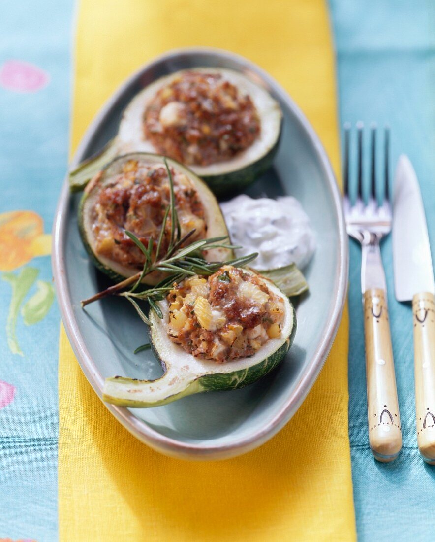 Stuffed round courgettes with tzatziki