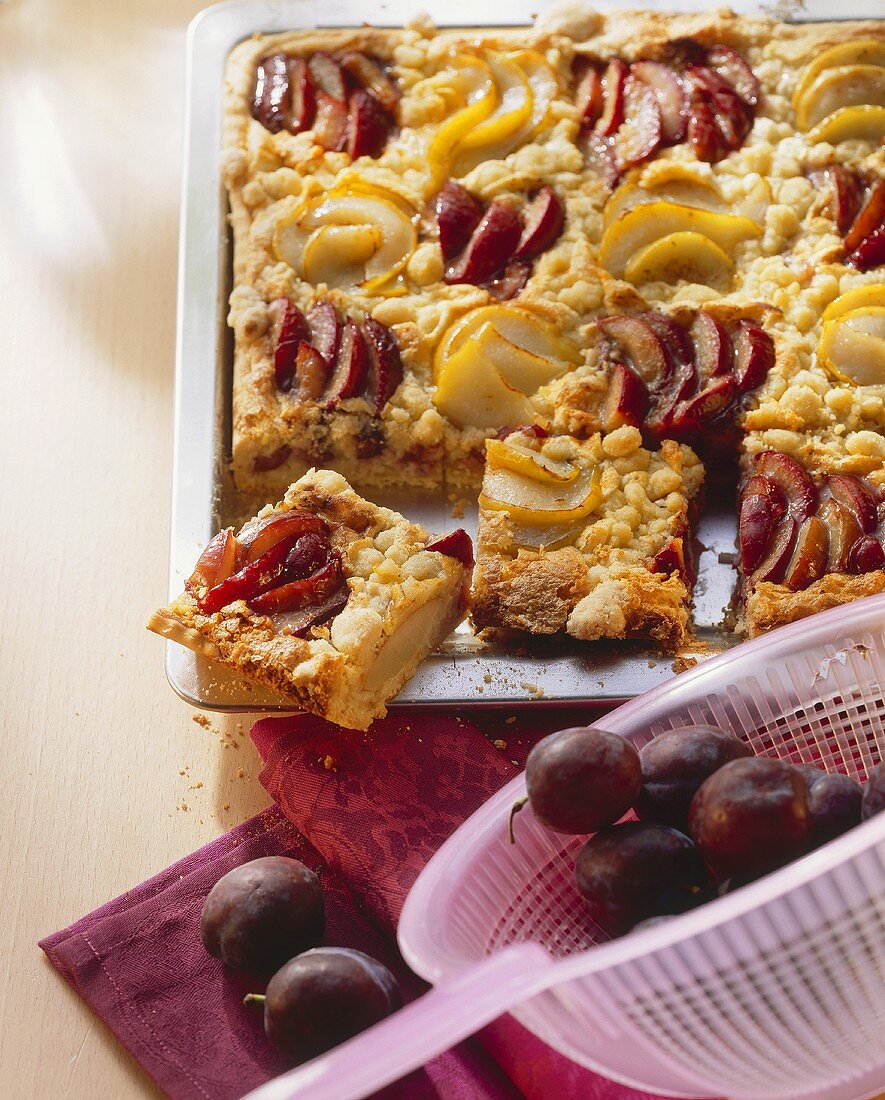 Plum and pear cake with crumble