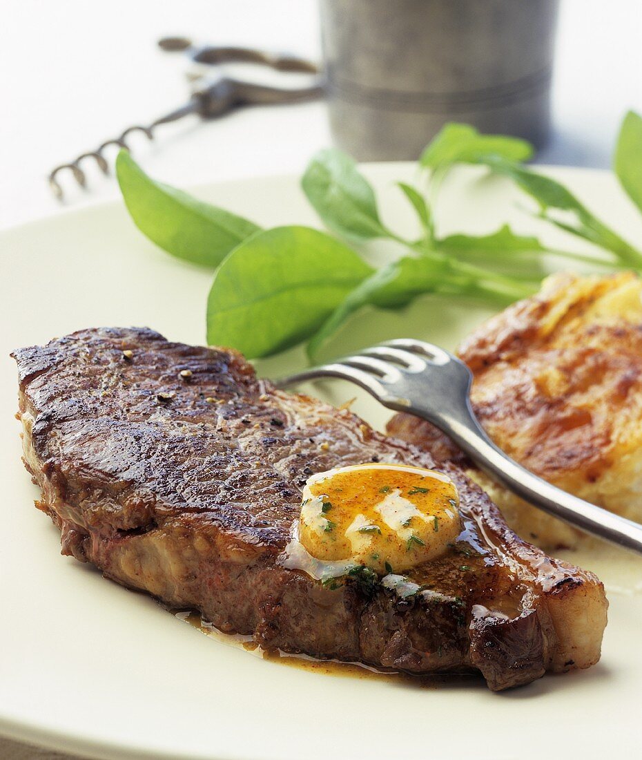 Beef steak with herb and mustard butter