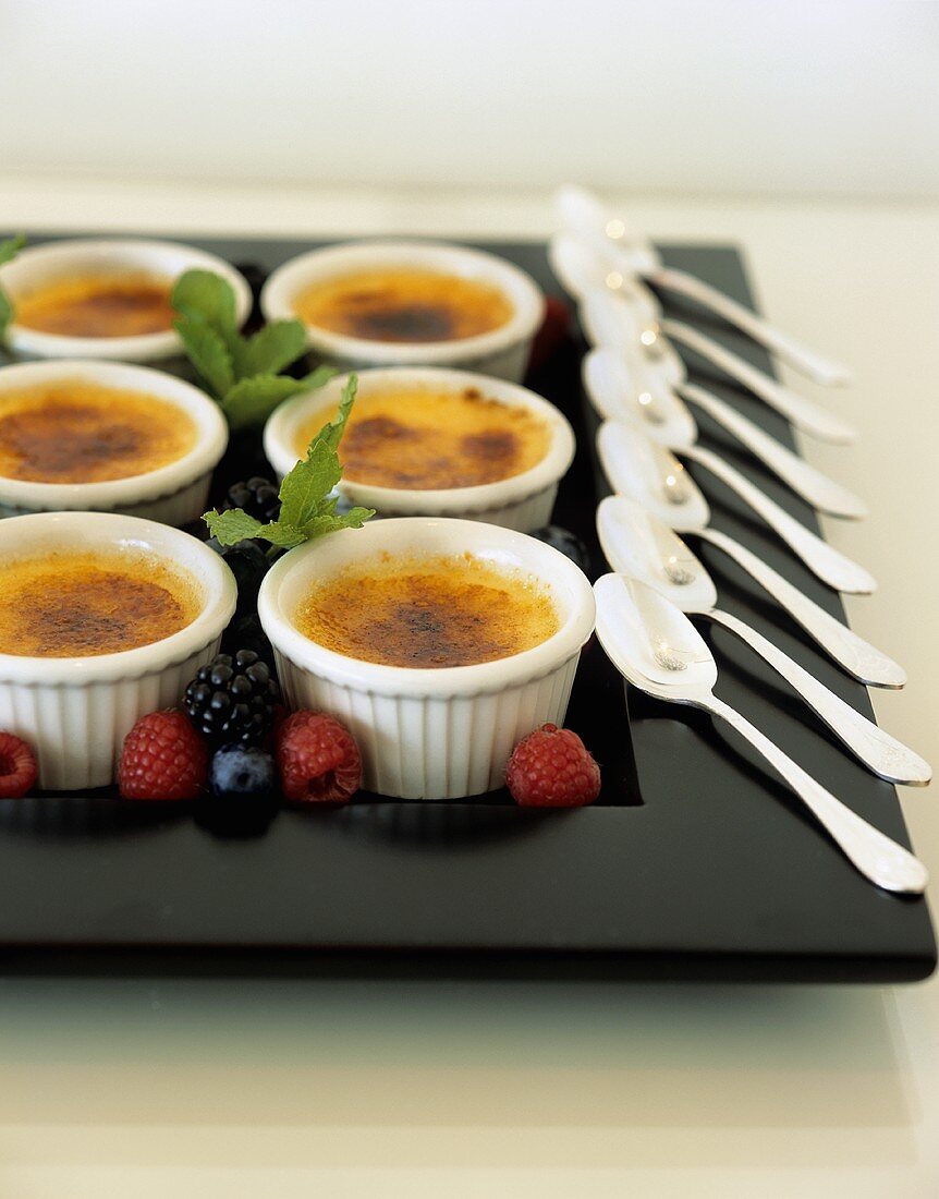 Crème brulee in moulds on party tray