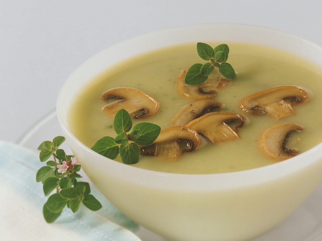 Potato and courgette soup with mushrooms