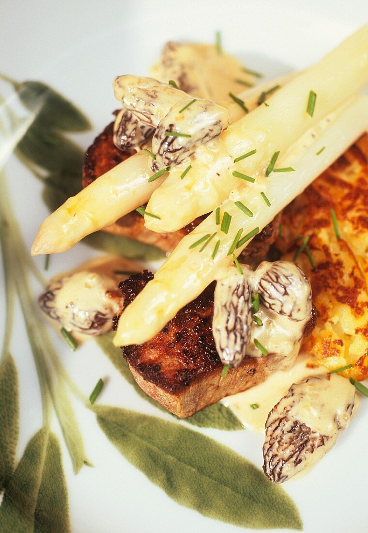 Loin of veal with white asparagus, morels and rosti