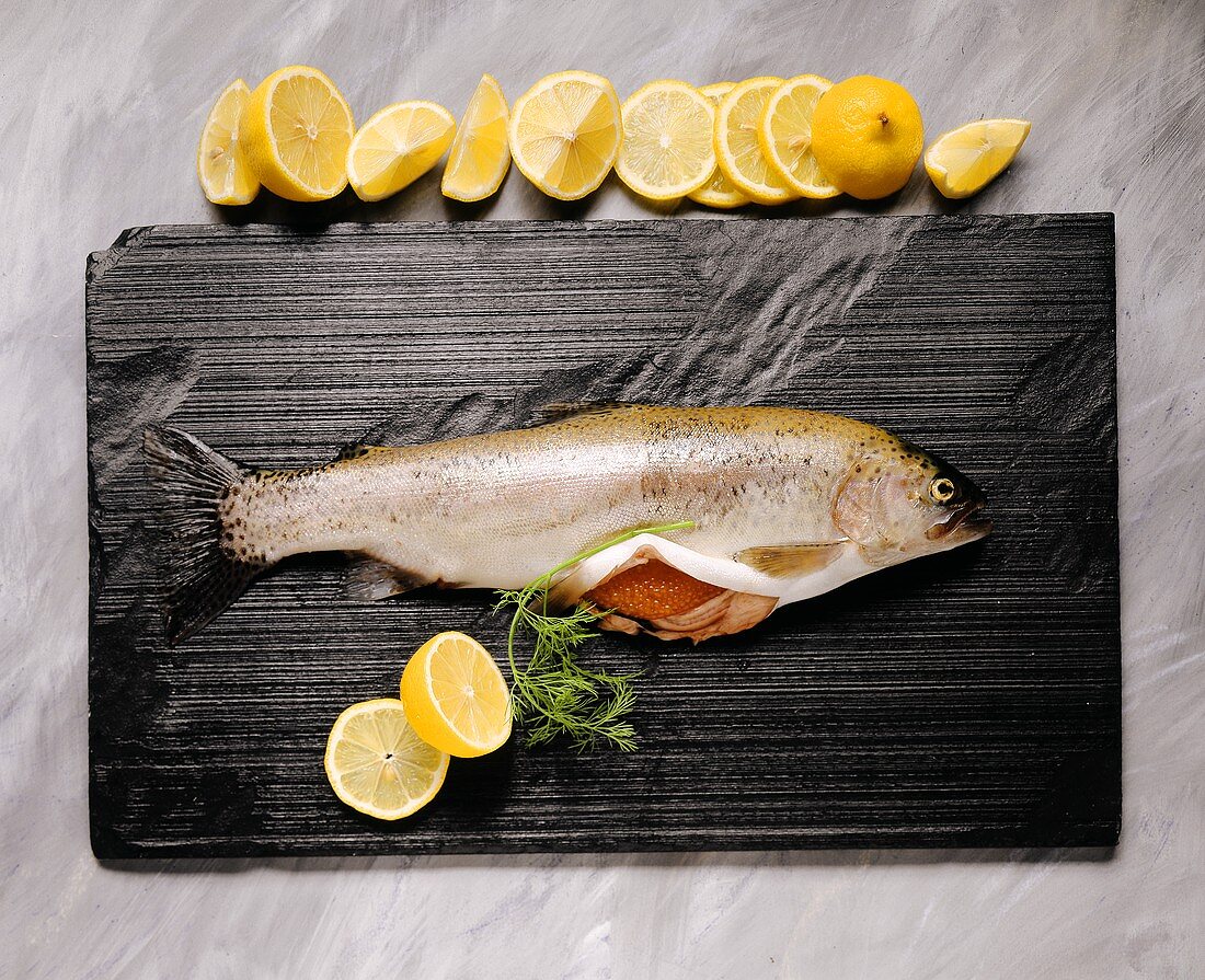 Salmon trout, cut open with caviare inside