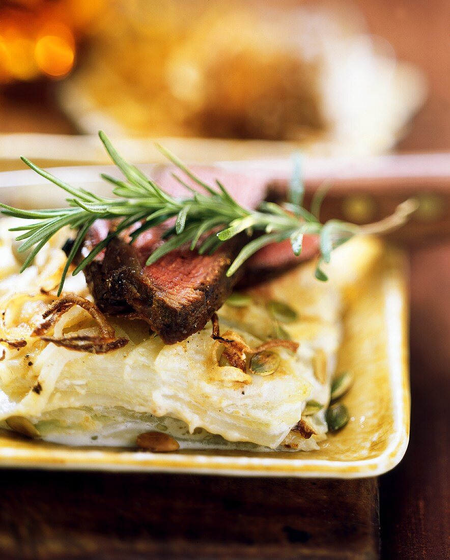 Kohlrabi gratin with lamb and rosemary