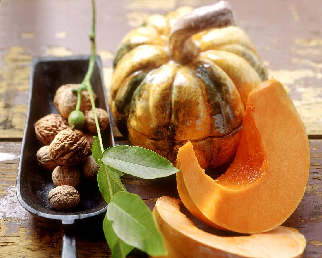 Autumn still life with walnuts and pumpkin