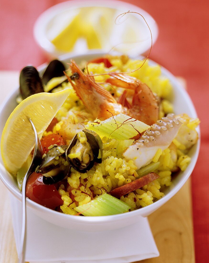 Paella in a small white bowl