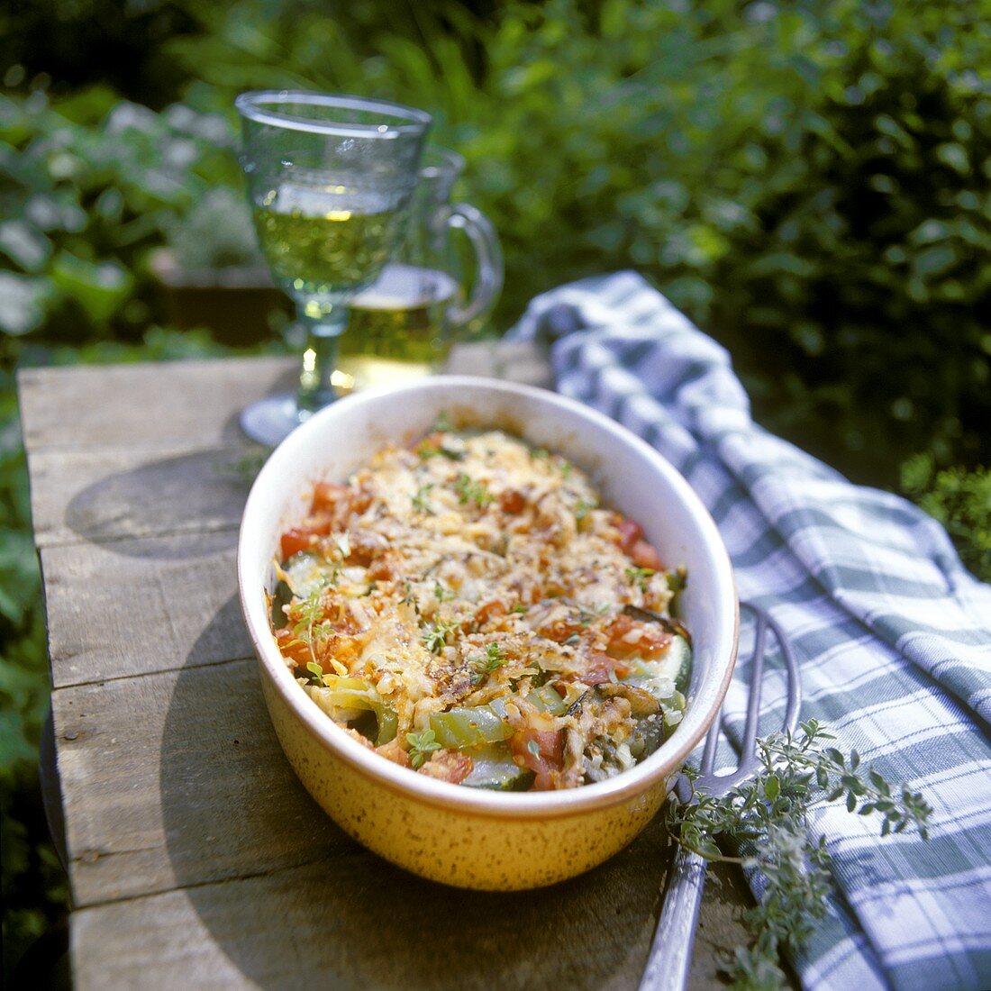 Provencal vegetable casserole with almond & cheese topping
