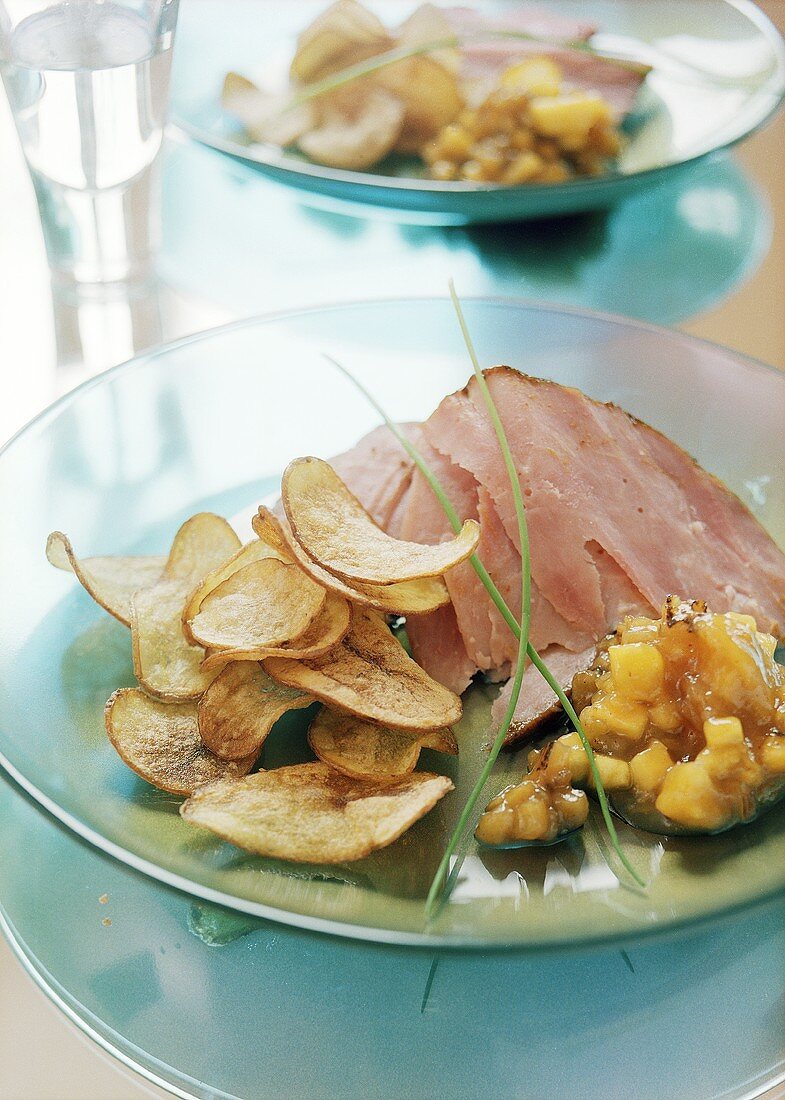 Ham with sweet potato crisps and aubergine chutney