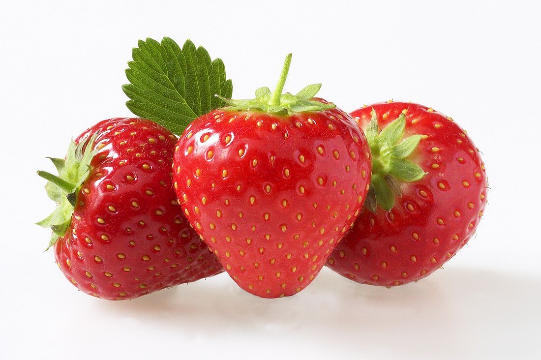 Three red strawberries