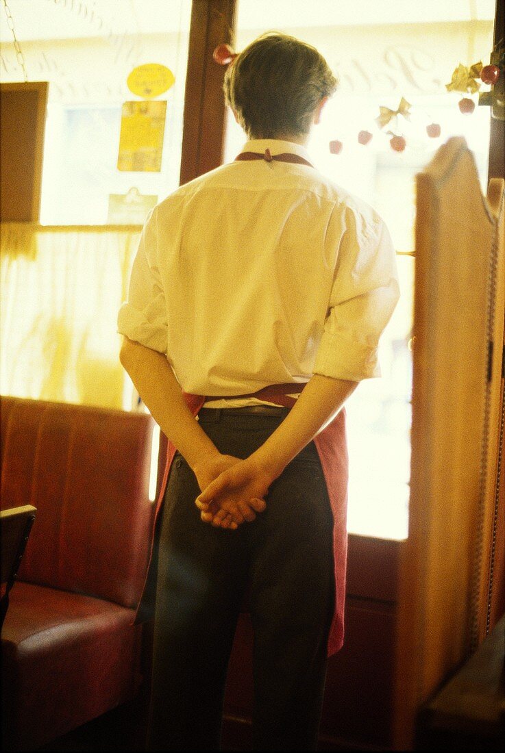 Sommelier (wine waiter) in restaurant, Bordeaux, France