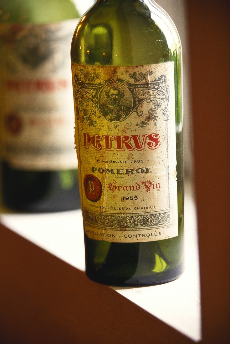 Empty 1955 Château Pétrus bottle (close-up)
