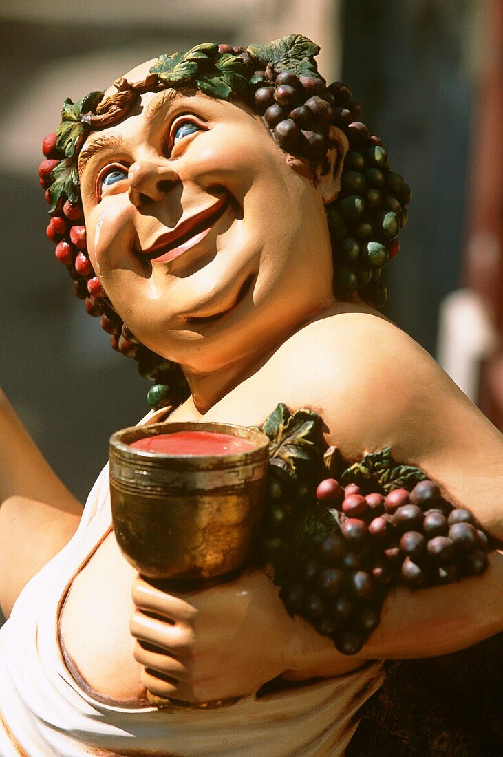 Bacchus, römischer Gott des Weins, bemalte Holzfigur