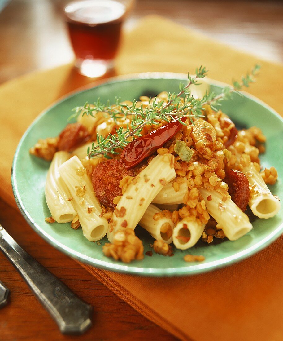 Rigatoni with lentil ragout and paprika salami