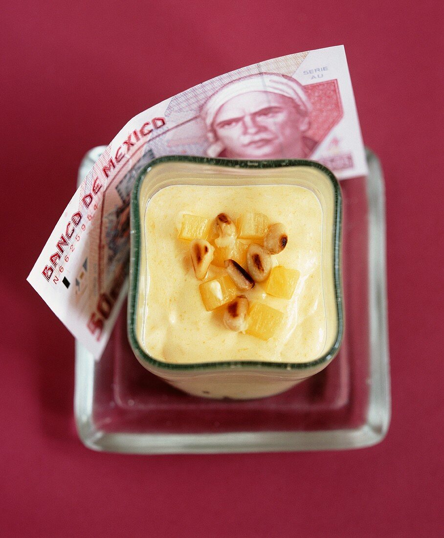 Mexican mango mousse with pineapple and almonds
