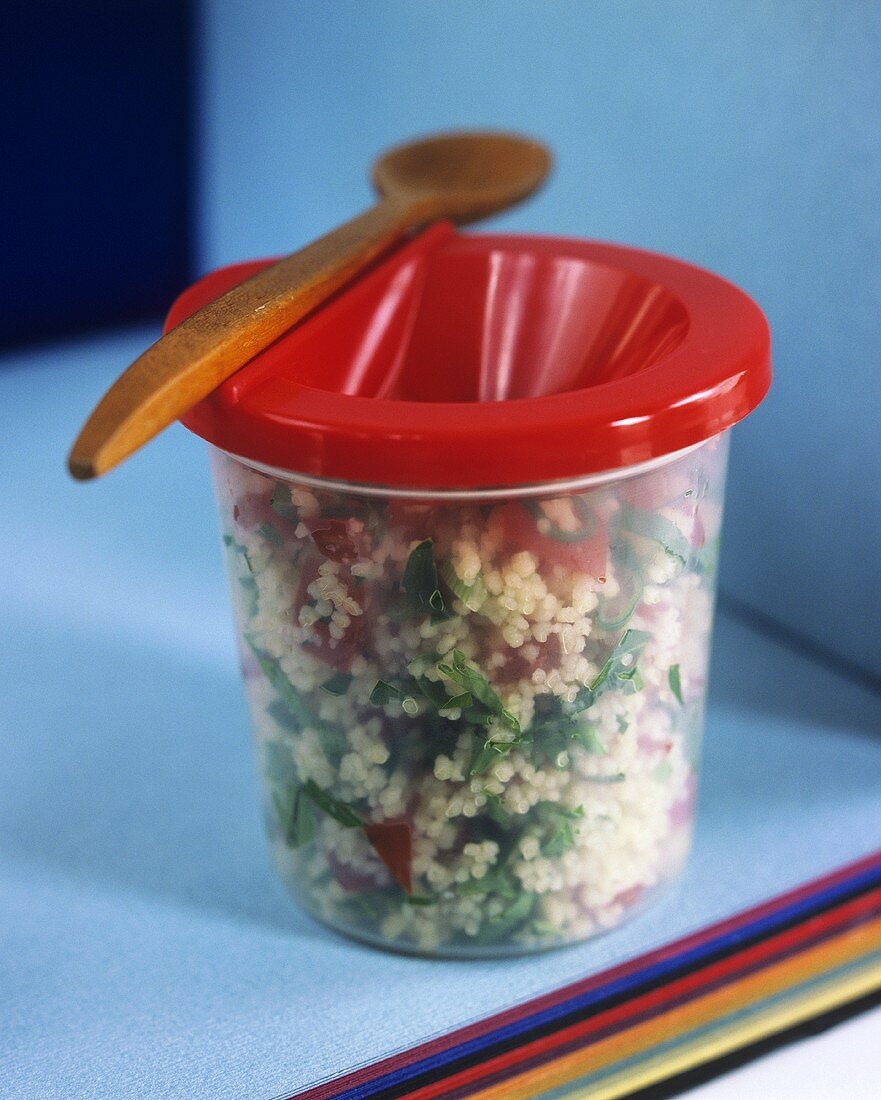 Couscous salad with parsley and tomatoes in sandwich box