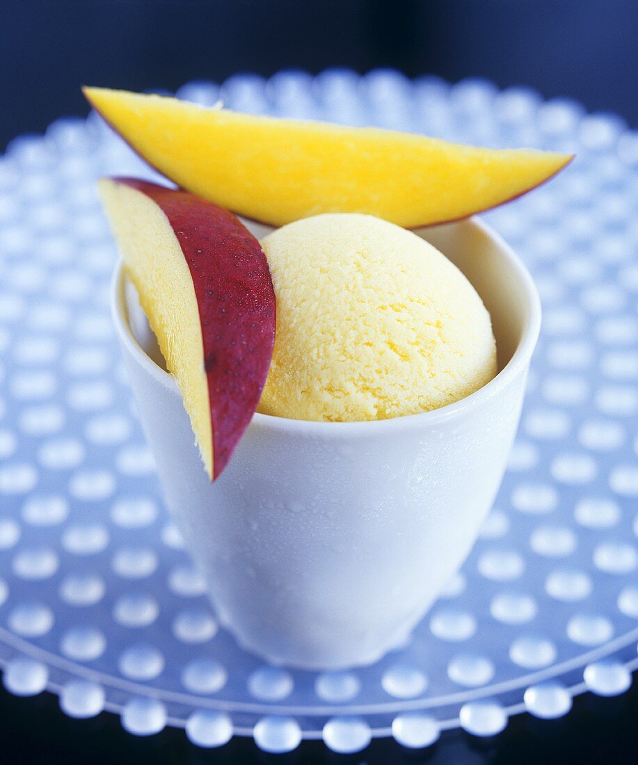 Mango & lemon ice cream in a tub