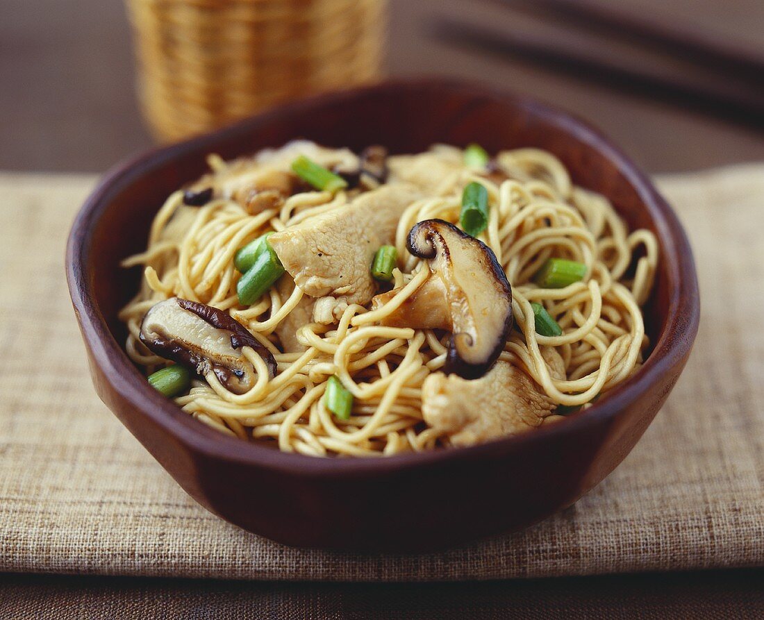 Asian egg noodles with pork and shiitake mushrooms
