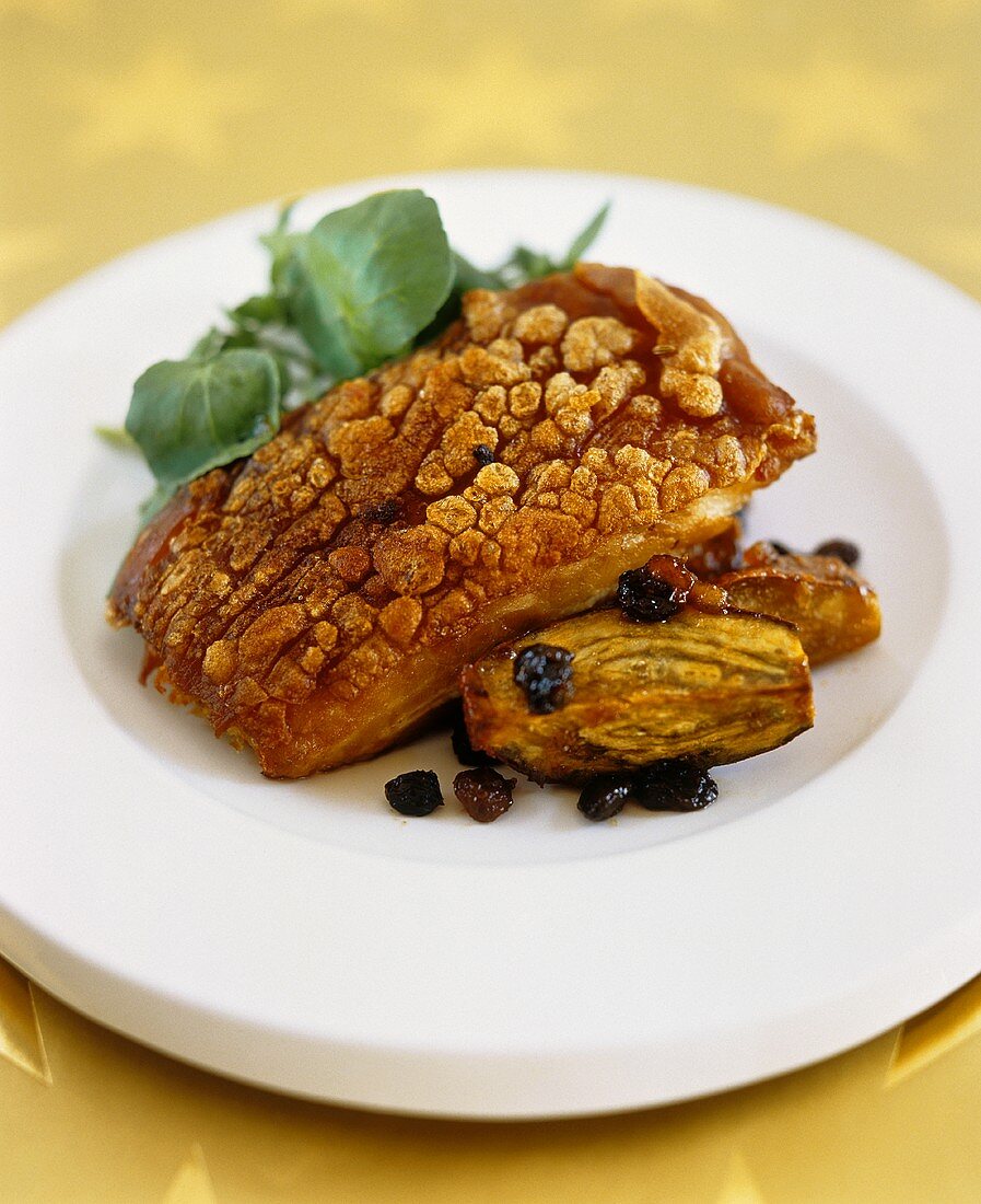 Belly pork with sweet potatoes, raisins and redcurrants