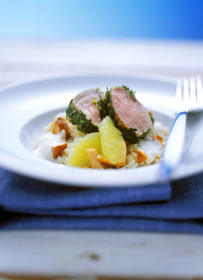 Veal fillet in herb coating on chanterelle risotto