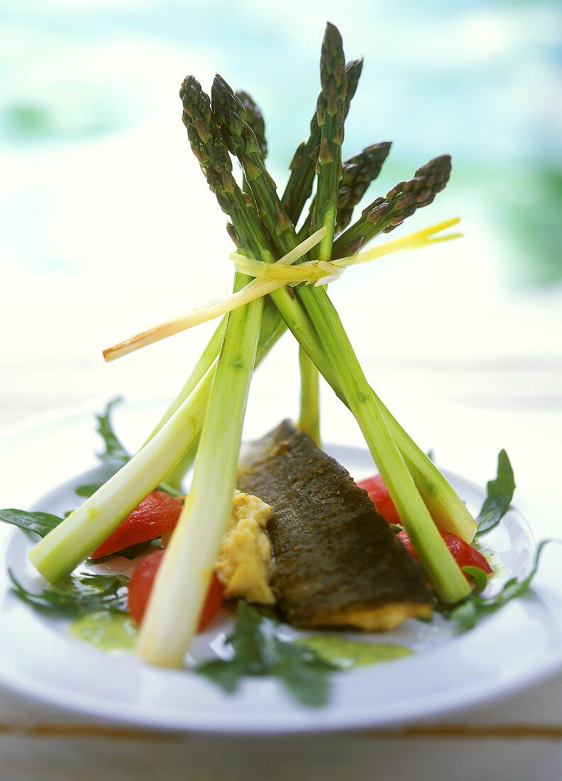Asparagus with almonds, tomatoes, rocket & whitefish fillet