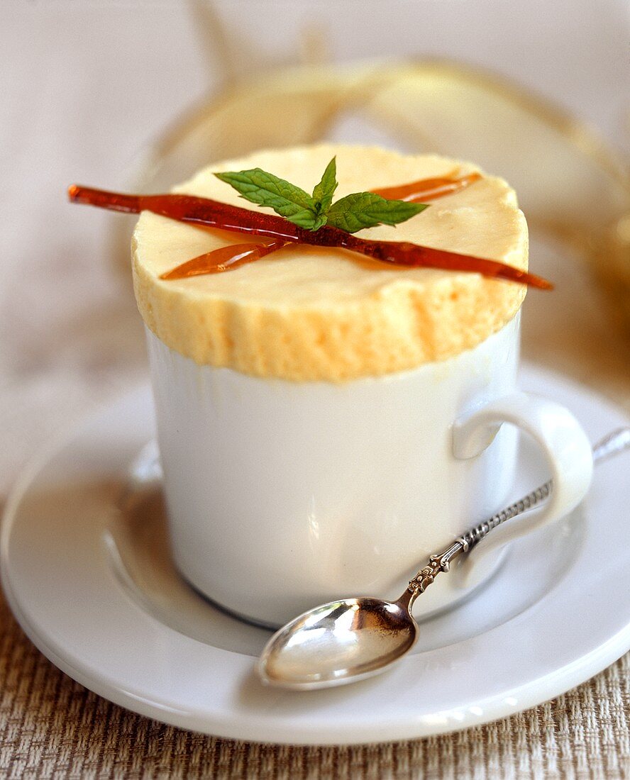Lemon ice cream soufflé, garnished with caramel sticks