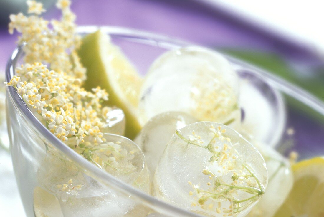 Elderflower ice cubes in a glass bowl