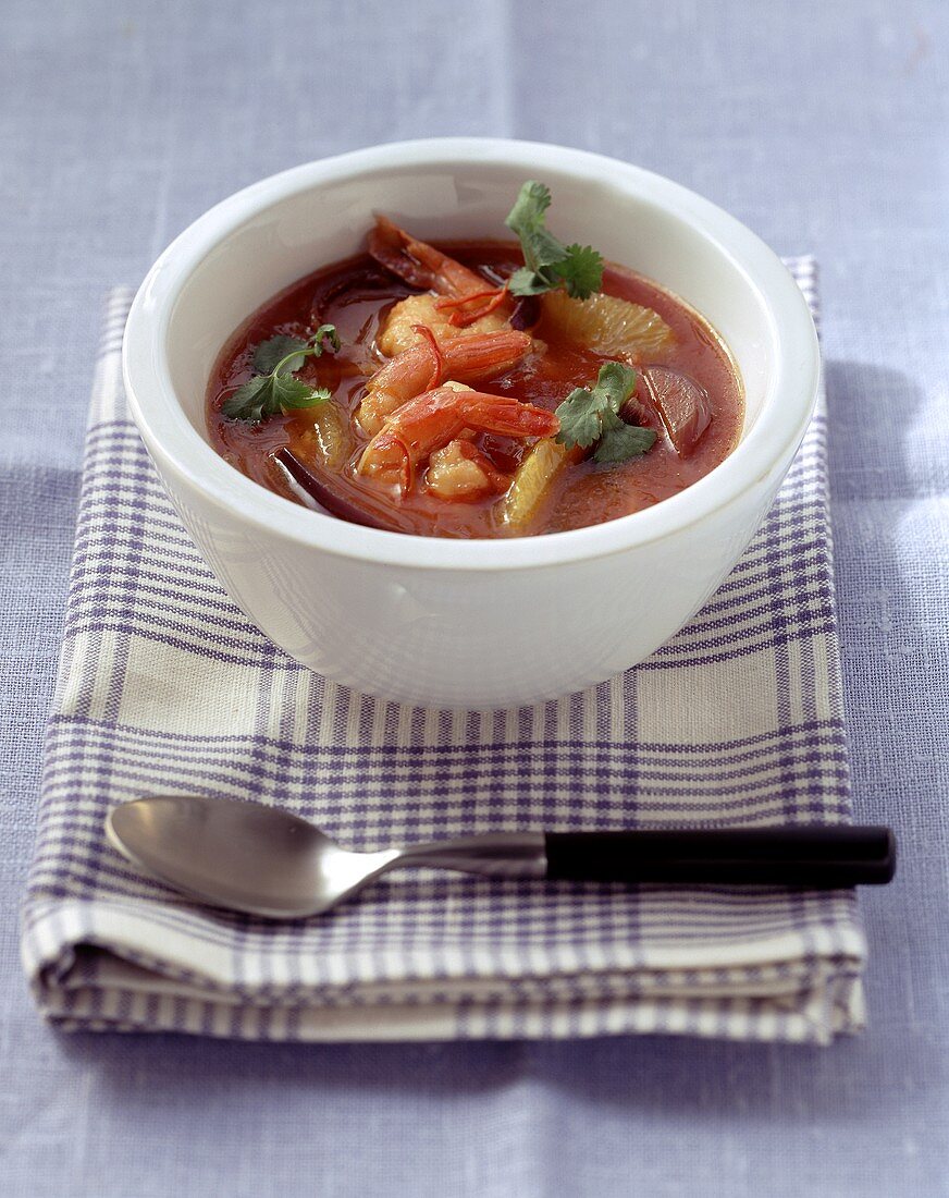 Tomato and orange soup with shrimps