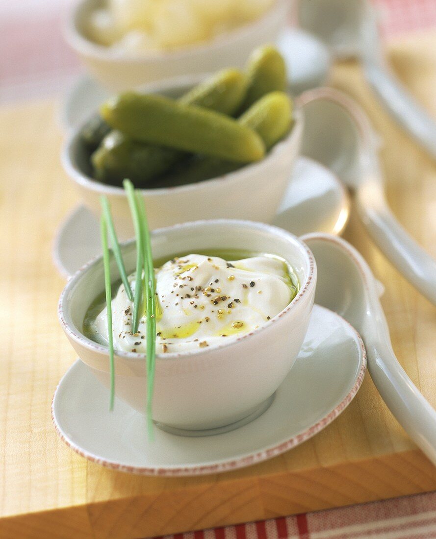 Sour cream with pepper, oil, herbs (dip for potatoes, etc.)