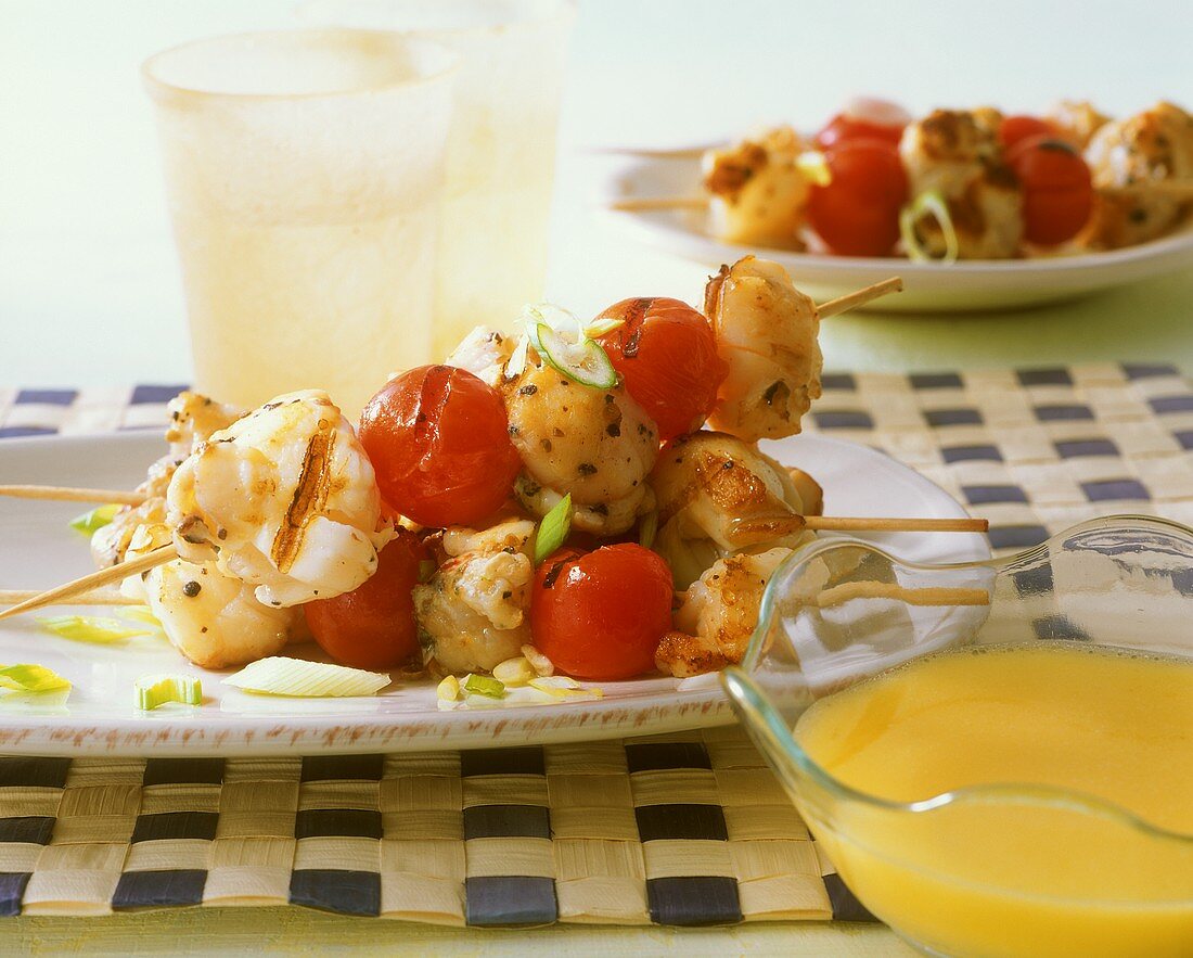 Grilled spiny lobster and tomato kebabs